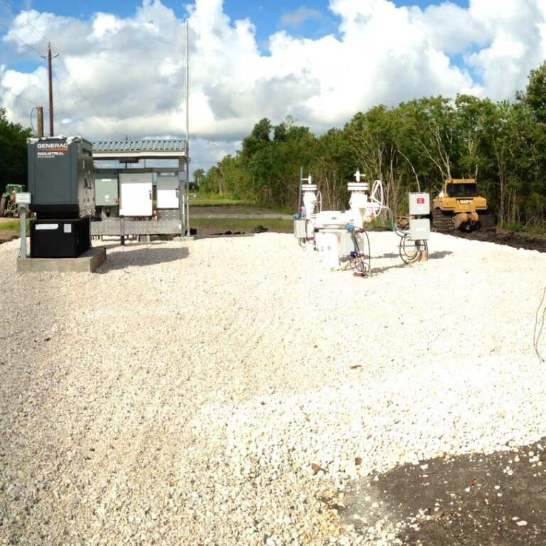 image of panels outside at a midstream facility surrounded by construction vehicles